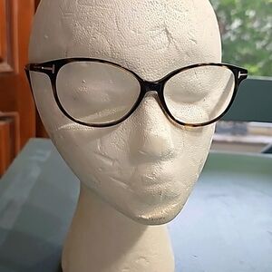 TOM FORD EYE GLASSES. Used but in very good condition. Made in Italy. Brown.